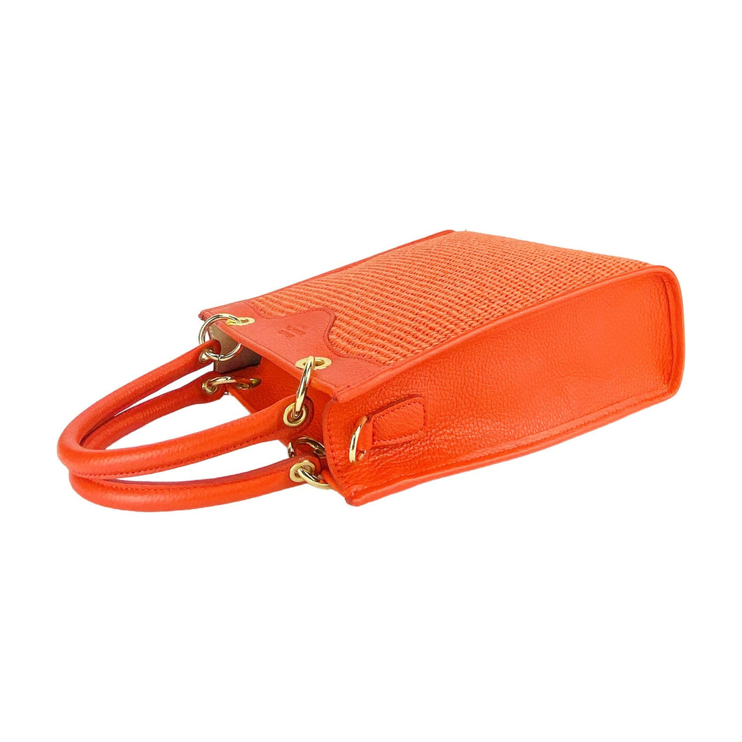 RB1026BM | Vertical women's handbag in genuine leather and straw Made in Italy. Removable and adjustable leather shoulder strap. Polished Gold Accessories - Coral Color - Dimensions: 24 x 29 x 9 cm-5