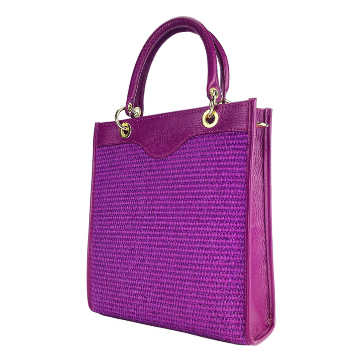 RB1026CN | Vertical women's handbag in genuine leather and straw Made in Italy. Removable and adjustable leather shoulder strap. Polished Gold Accessories - Raspberry Color - Dimensions: 24 x 29 x 9 cm-0